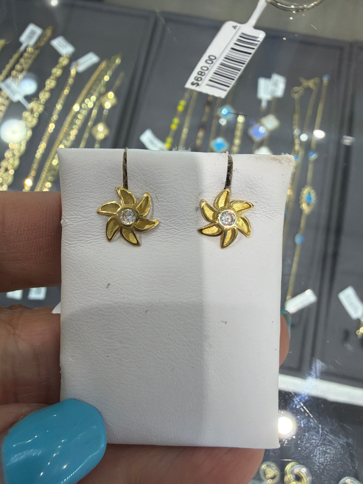 Aretes 18k flor