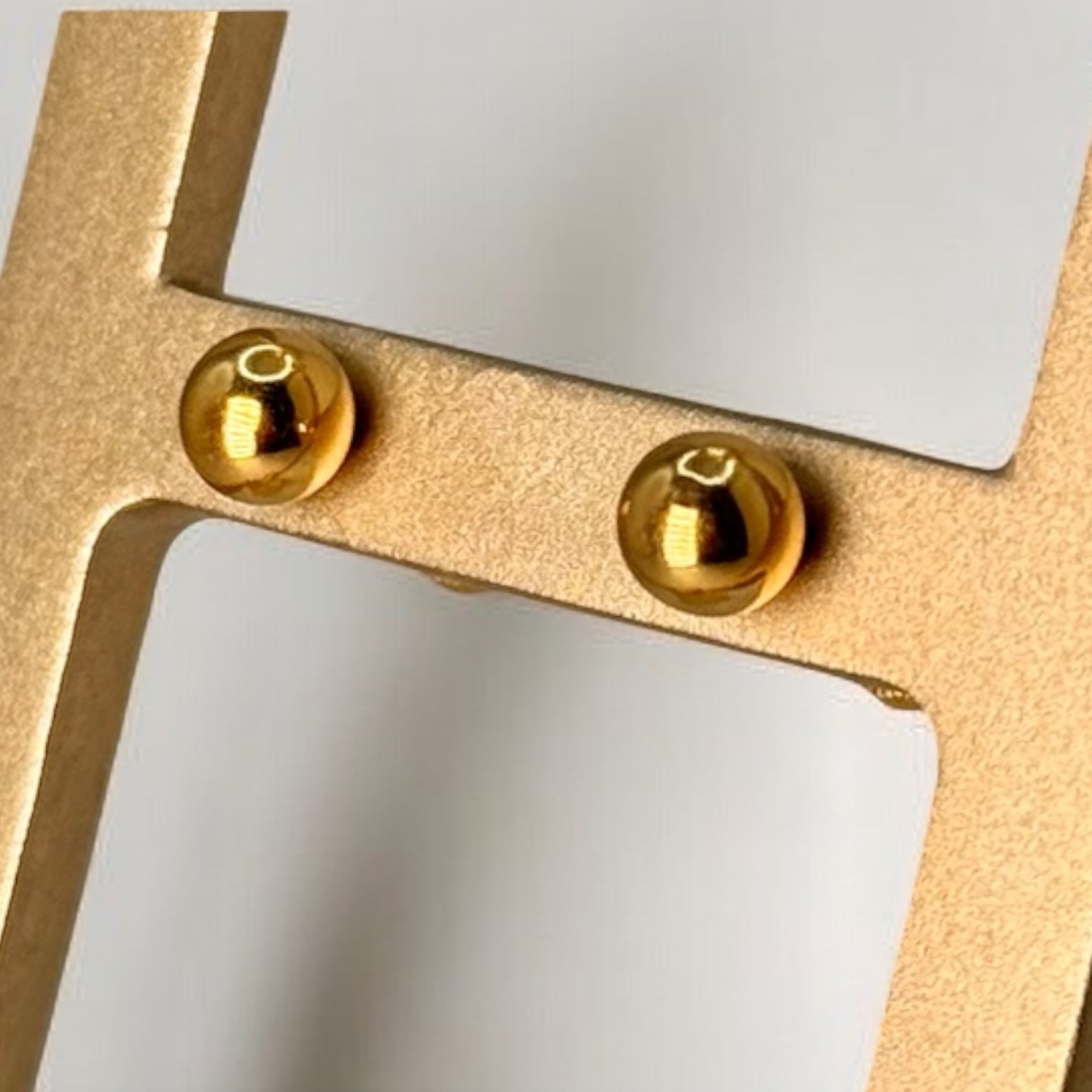 Gold sphere earrings