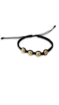 Pulsera negra 4 balines