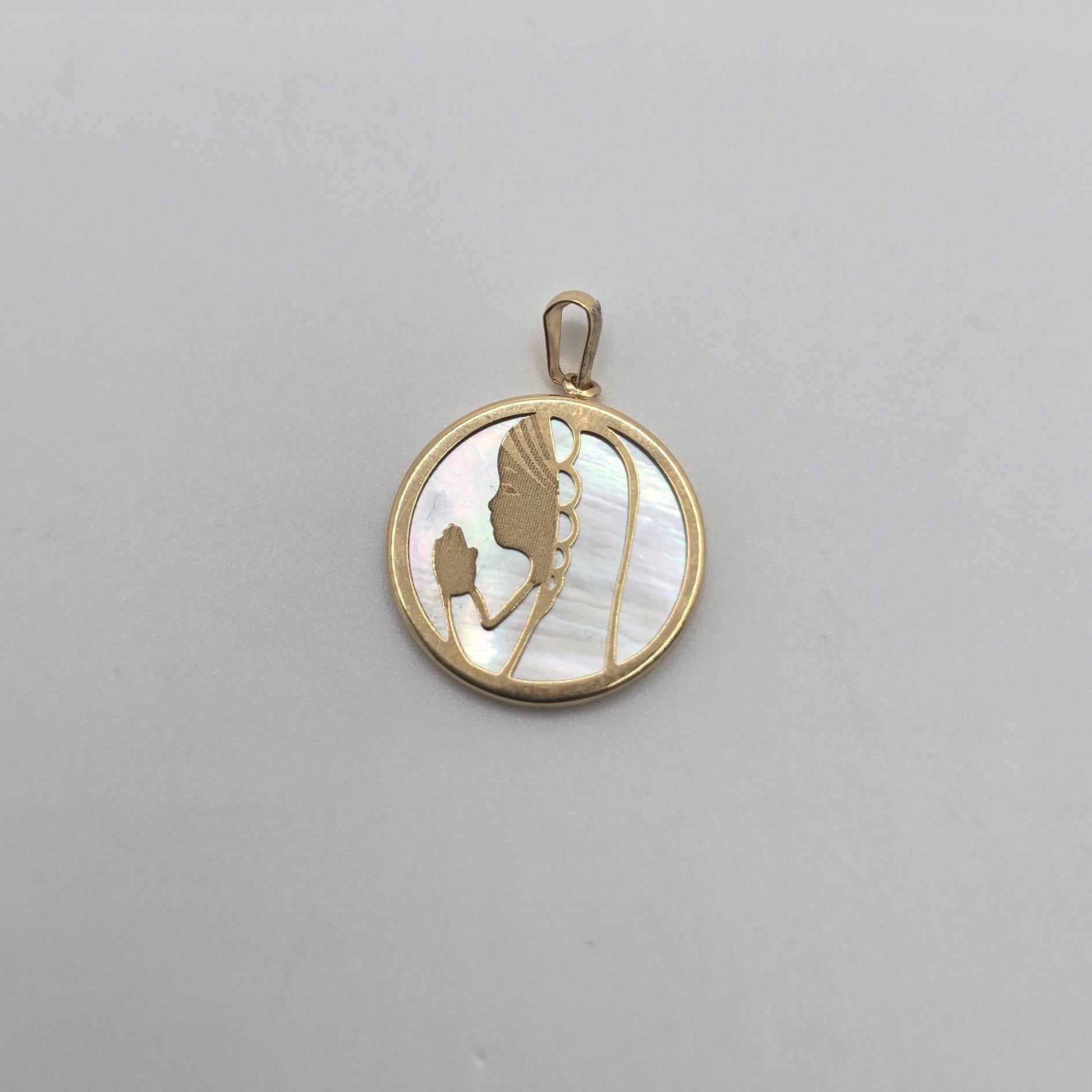 Gold Pendant of the Virgin Mary