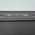 Elegante pulsera bicolor