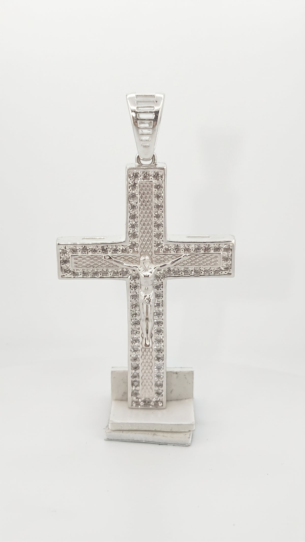 Dije de Cruz de plata