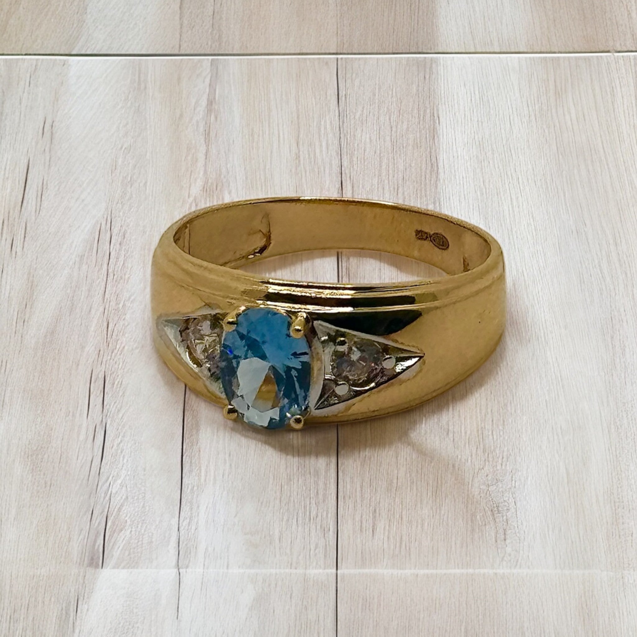 Ring with a Stunning Blue Topaz and Diamond Combination