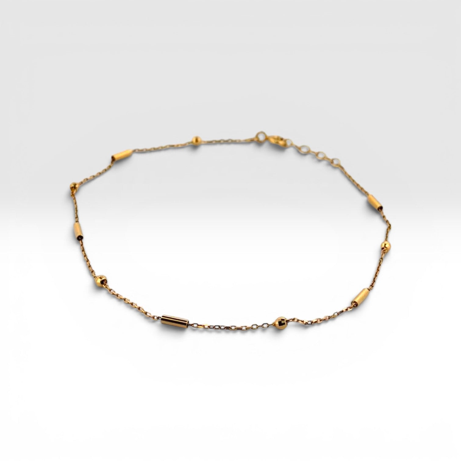 Gold Cylindrical Tube and Bead Station Anklet