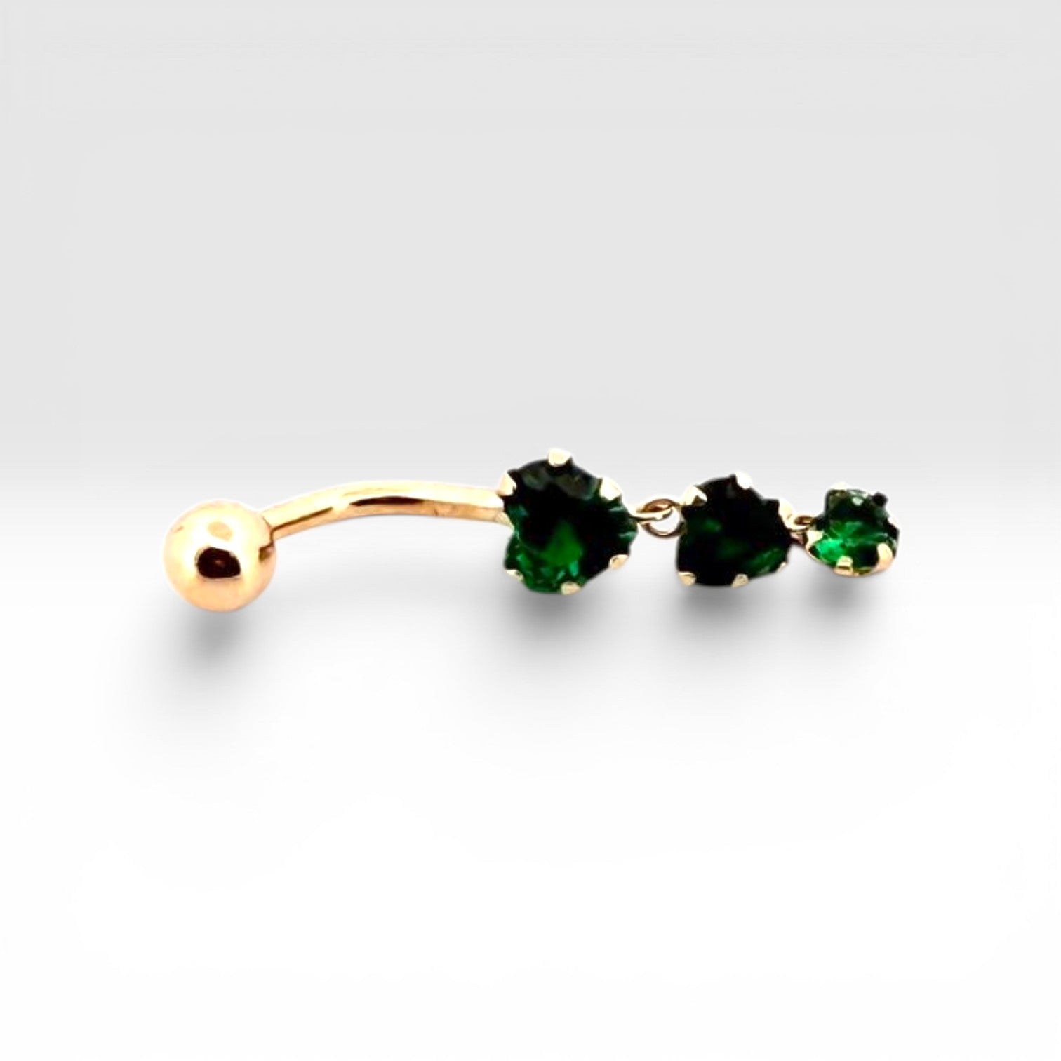 Emerald Glow Belly Piercing
