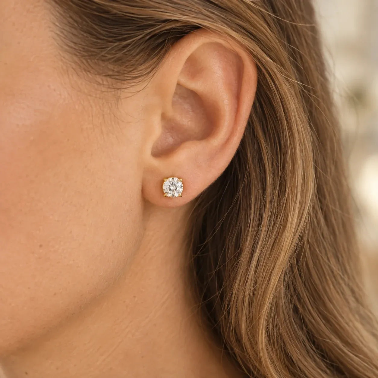 Diamond stud on ear